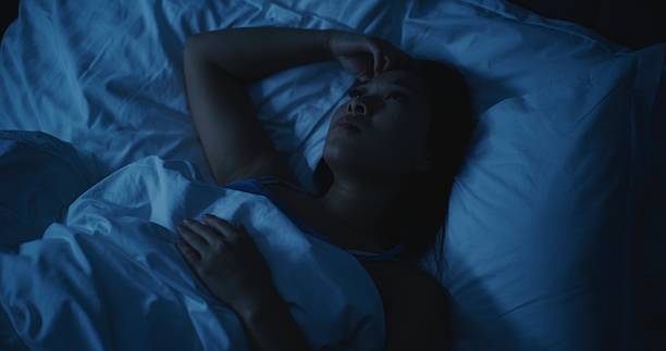 istock Young Tired Woman With Anxious Thoughts Cannot Sleep at Night 2237986897