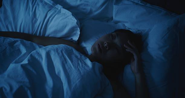 istock Young Tired Woman With Anxious Thoughts Cannot Sleep at Night 2237987362