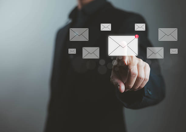 istock Businessman touching digital email icon with notification, concept of online communication, email marketing, business messaging, digital contact, and customer service technology for modern corporate communication. 2237987464