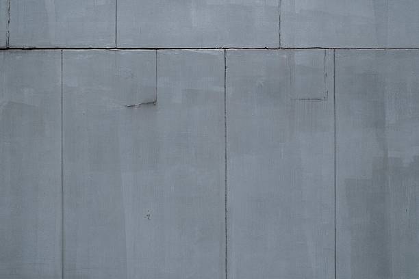 istock The pattern of surface wall concrete for background. Abstract of surface wall concrete for vintage background. Rusty damaged to surface wall. 2237994369