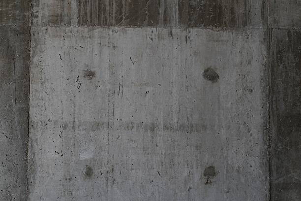 The pattern of surface wall concrete for background. Abstract of surface wall concrete for vintage background. Rusty damaged to surface wall. Wall texture for background.