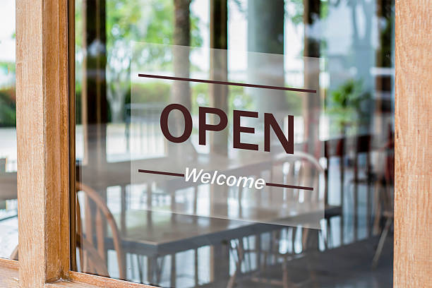 istock Store open sign hanging on the window 2237996098