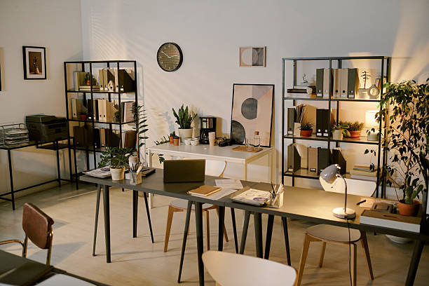 istock Modern Office Interior Featuring Organized Desks and Shelves with Documents 2237998792