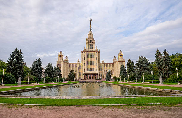 istock Grand Architectural Moscow State University Main Campus Building with Reflection Pond on a Cloudy Day, Moscow, Russia, 9 August 2025 2238000906