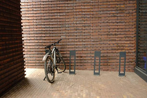 Bicycle parking place, made of bricks, building exterior, architecture, apartment house