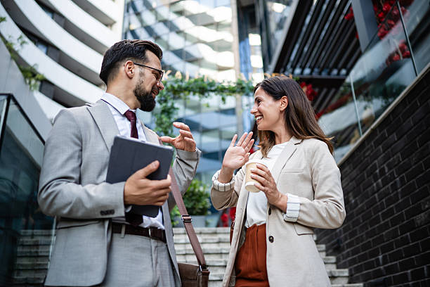 istock Business people talking and gesturing in urban setting 2238003457