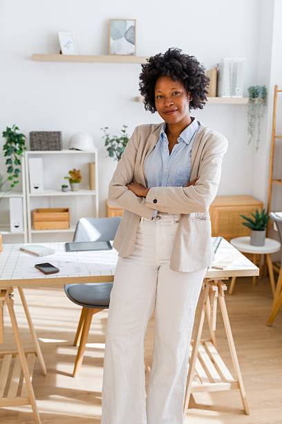 istock Confident black woman architect working in modern office 2238005554