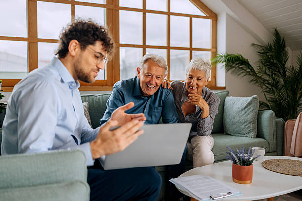 istock Financial advisor guiding senior couple at home 2238005659