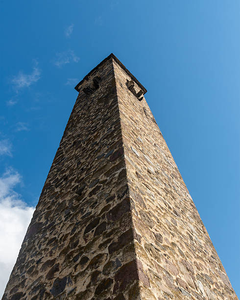 istock Stone tower against blue sky. Medieval stone building. 2238012106