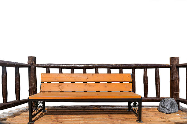 Wooden bench with fence on a white background.