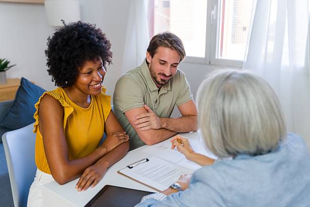 istock Interracial couple meeting financial advisor for planning future 2238014795