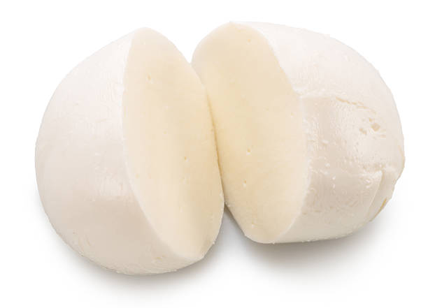 istock Ball of mozzarella cheese cut in half on white background. File contains clipping path. 2238015478