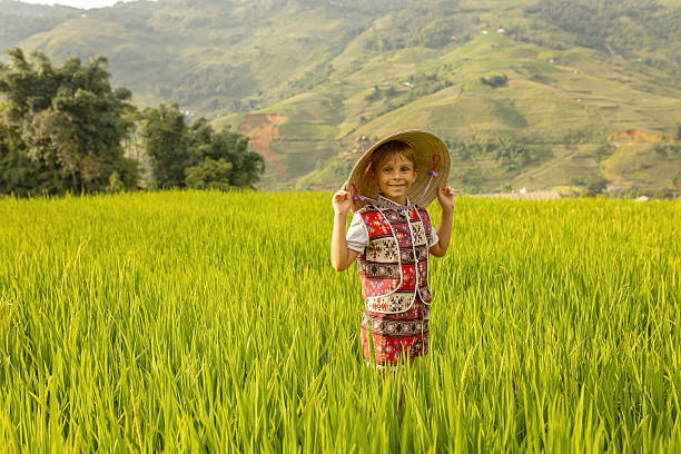istock Family with children, cute blond boy, visiting Sapa rice fields 2238022425