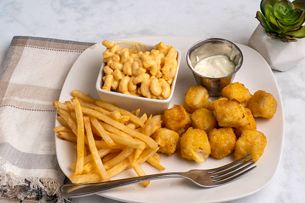 istock haddock bites  with mac and cheese and fries 2238025853