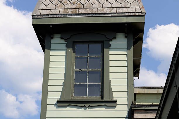 istock Side Window On An Exterior Building Facade With Architectural Detail. 2238027121