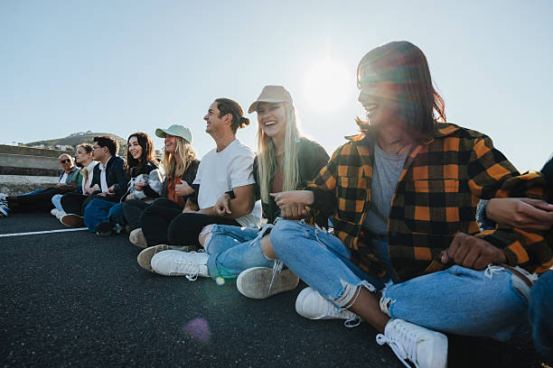 istock Group of young activists uniting in peaceful protest outdoors during sunny day 2238028931
