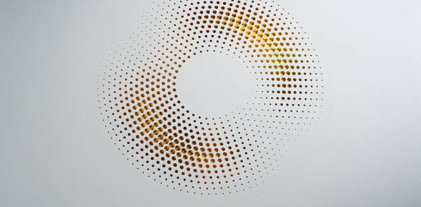 istock Minimalist radial dot pattern cut into white paper forming circular halftone spiral 2238029085