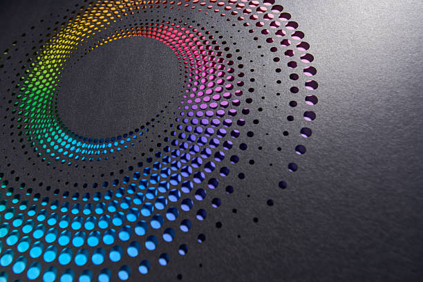 istock Colorful halftone spiral cut into black paper creating vibrant circular gradient design 2238029615