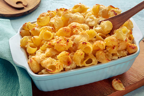 Mac and Cheese, macaroni pasta, oven-baked in a casserole with cream, freshly cooked