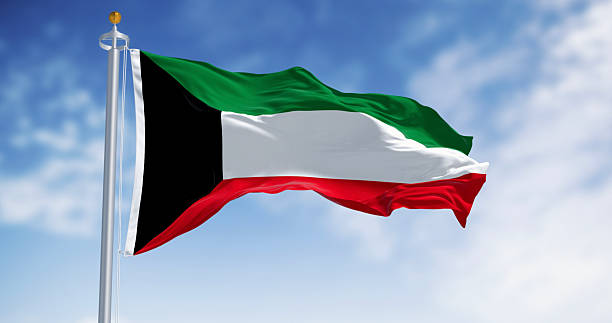 istock Kuwait national flag waving in the wind 2238046693