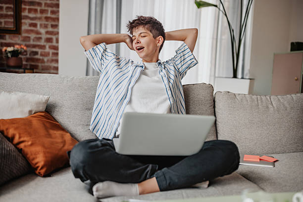 istock Person yawning while working on laptop 2238053355