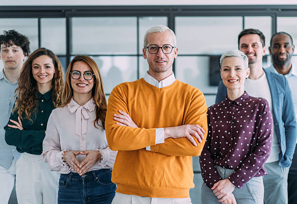 istock Confident businessman and his team. 2238058335