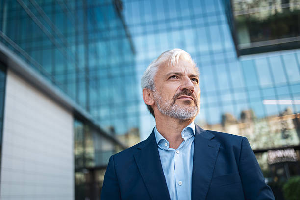 istock Mature businessman looking confident in city 2238059028