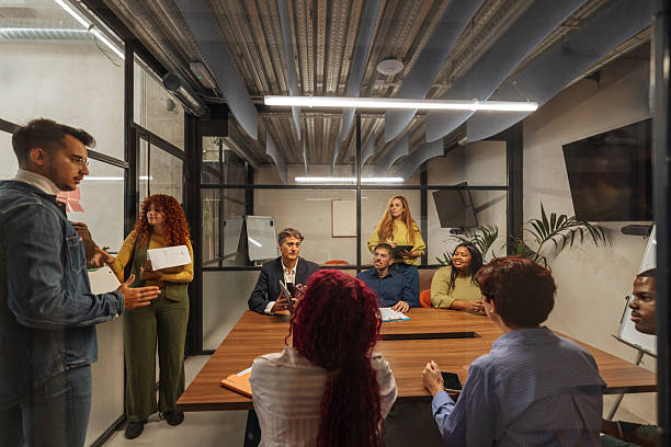 istock Marketing team discussing new project during briefing in modern office 2238061399