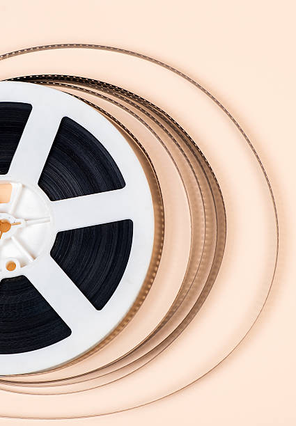Old Film Reel on the Paper Background closeup