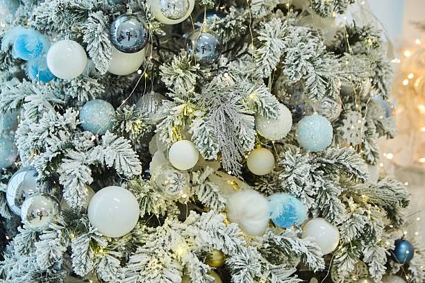 istock Elegant decorated with balls and figures Christmas tree 2238071330