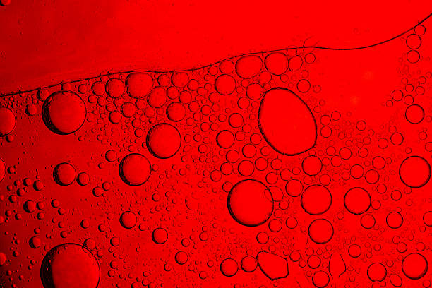 istock Red drink bubbles close up macro,Abstract splashing of red wine. Macro shot. 2238077806