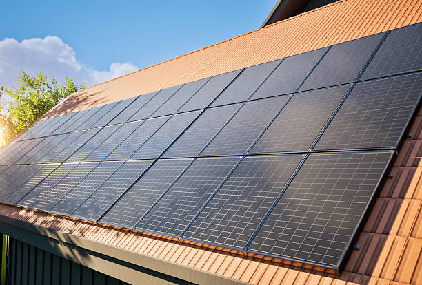 istock Black solar panels on roof 2238078060
