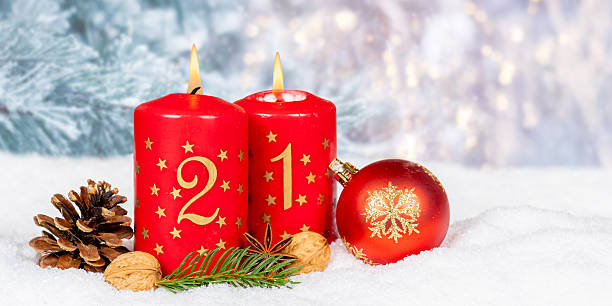 istock Second 2nd Sunday in advent Christmas time copyspace copy space with burning candle snow winter panorama 2238078718