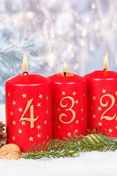 istock Fourth 4th Sunday in advent Christmas time copyspace copy space with burning candle snow winter 2238078896