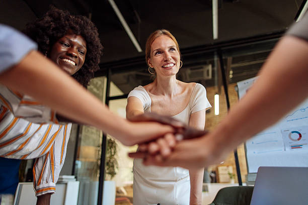 istock Diverse Team Collaborating and Celebrating Success in a Modern Office Setting 2238079812