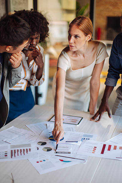 istock Business Team Discussing Financial Reports During a Collaborative Meeting at an Office 2238079853
