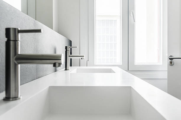 istock a modern design bathroom, one piece frameless mirror porcelain sinks 2238080299