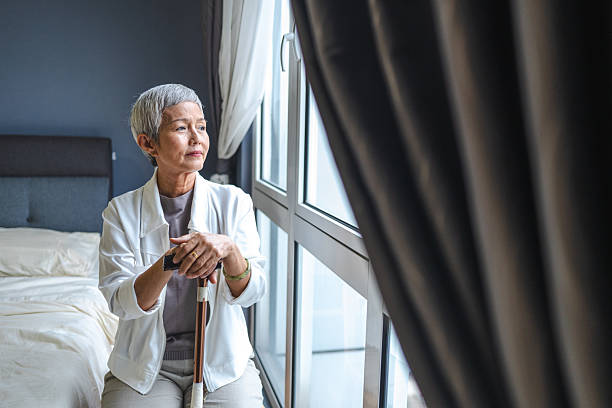 istock A Solitary Gaze: Decades of Memories Reflected in the Light 2238083019