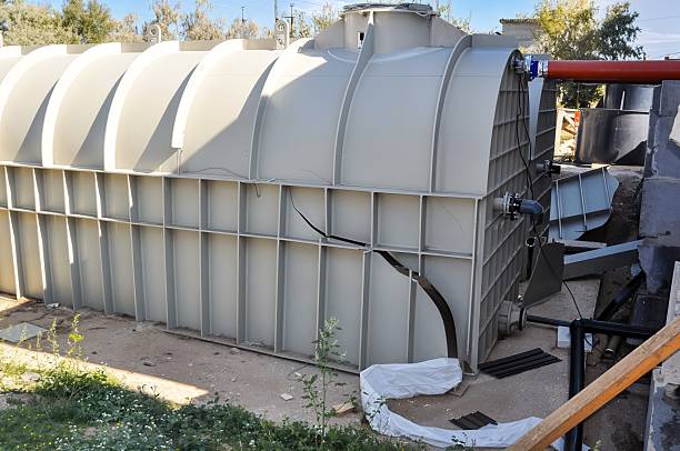 istock Large industrial water tank with noticeable damage 2238087936