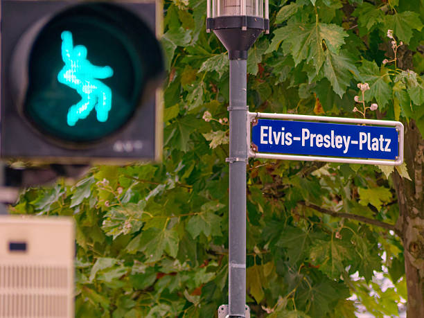 Friedberg, Germany - Pedestrian traffic light featuring Elvis Presley's silhouette in a dancing pose. Presley lived in Bad Nauheim, where he was stationed as a soldier in nearby Friedberg from 1958 to 1960. A square in the town was named after him.