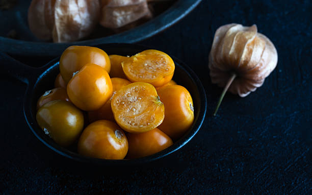 Close-up of fresh golden berries, also known as physalis or ground cherries.