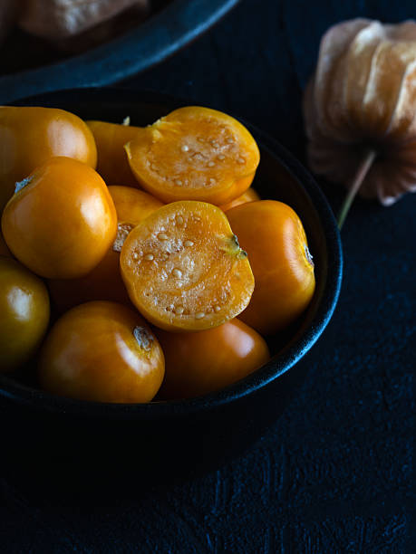 Close-up of fresh golden berries, also known as physalis or ground cherries.
