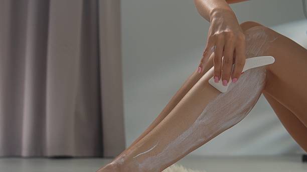 istock Home Beauty Routine with Hair Removal Cream Application 2238092034