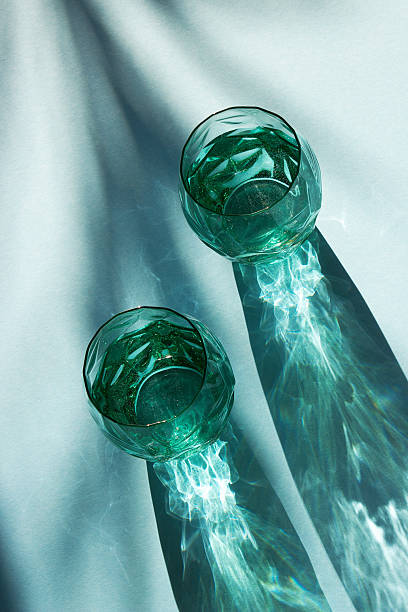 istock Glasses of water and  on a blue 2238097349
