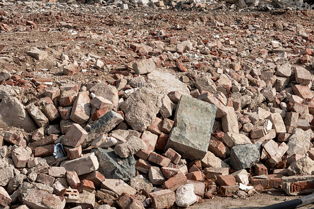 Construction debris and destroyed materials creating a large pile of rubble