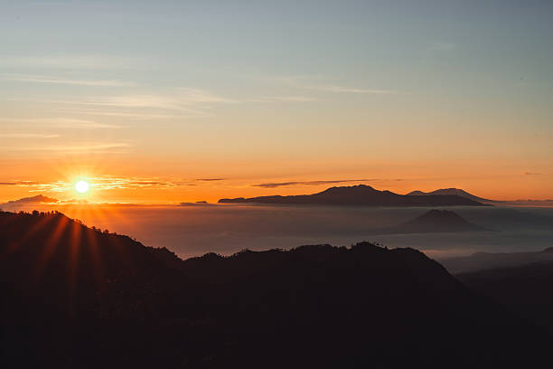 istock Breathtaking sunrise over misty mountains 2238104383
