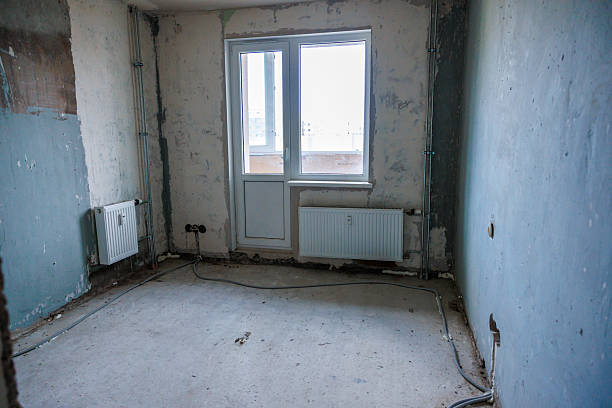 istock Unfinished Room with Concrete Flooring and Exposed Wiring 2238105970