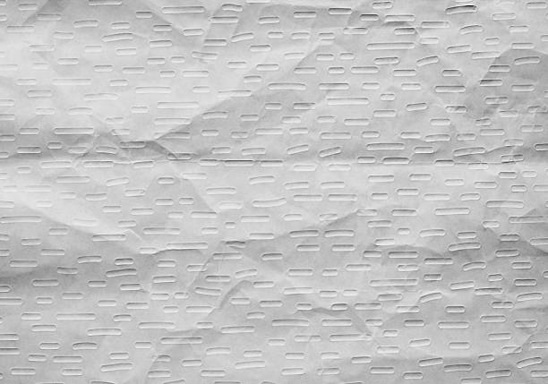 Close up of light wrinkled wrapping paper with embossed oval patterns, minimal neutral background with textured surface, ideal for packaging design, decoration, craft projects and graphic overlays