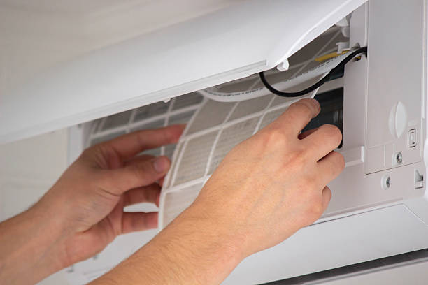 istock Air Conditioner Maintenance: Removing a Dirty Air Filter 2238111262