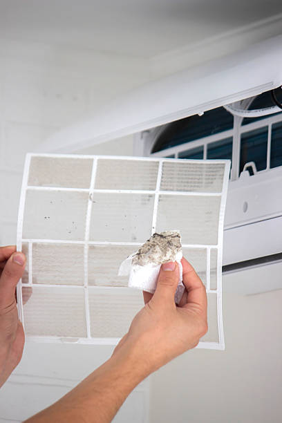 istock Air Conditioner Maintenance: Removing a Dirty Air Filter 2238111266